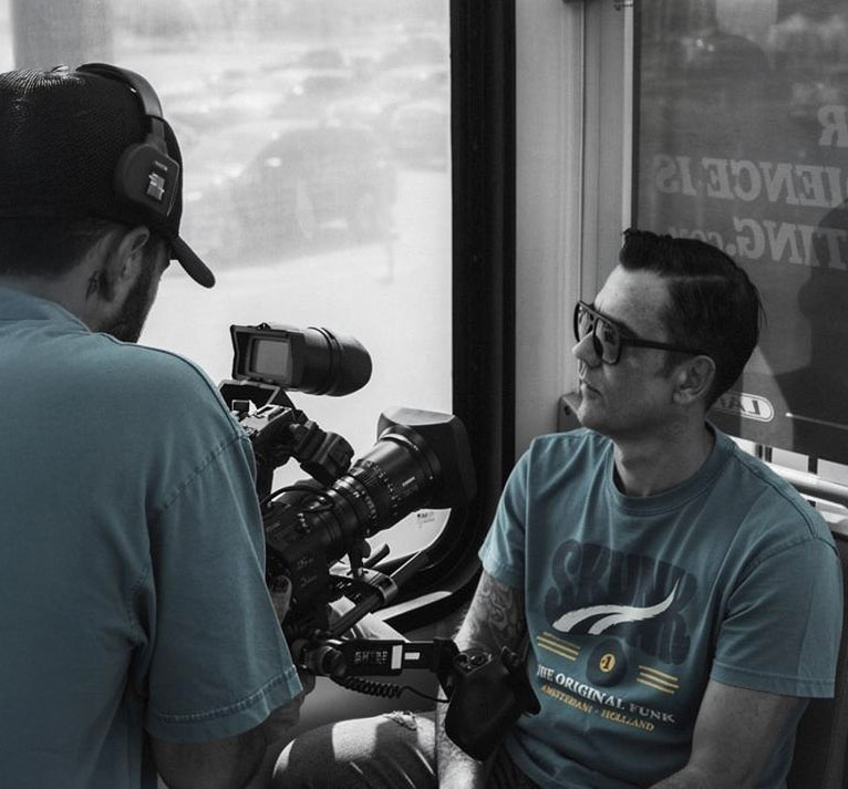 Stone Slade filming on the road